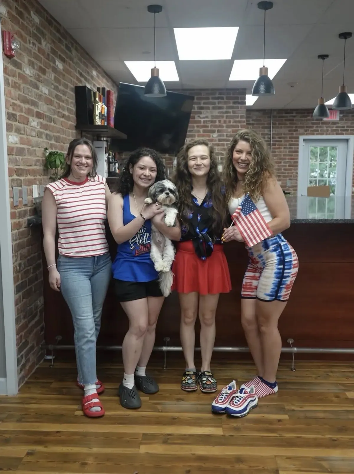 Team members in red, white and blue